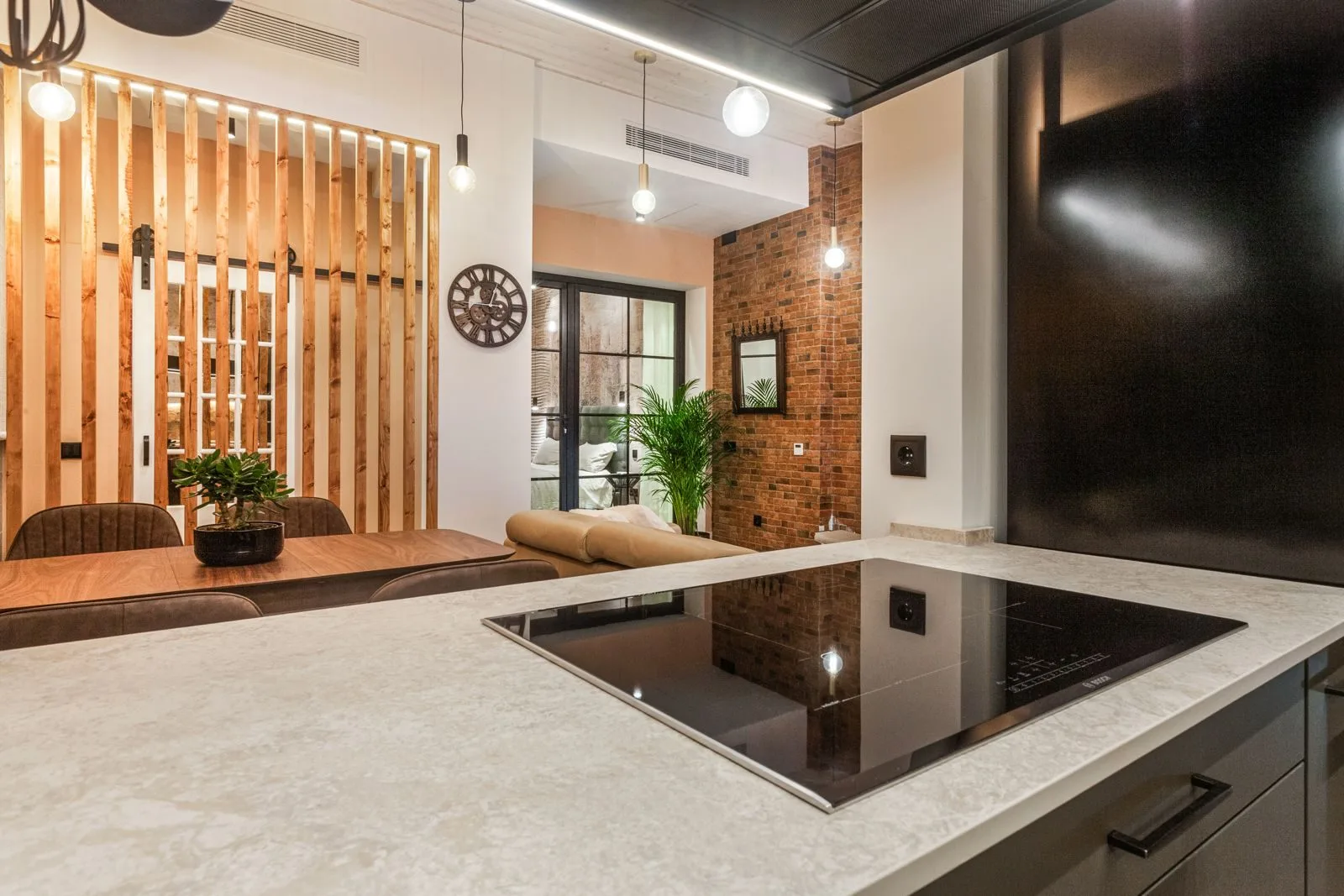 Kitchen counter and cabinetry — restaurant to loft conversion Amoreira by Maya's Homes