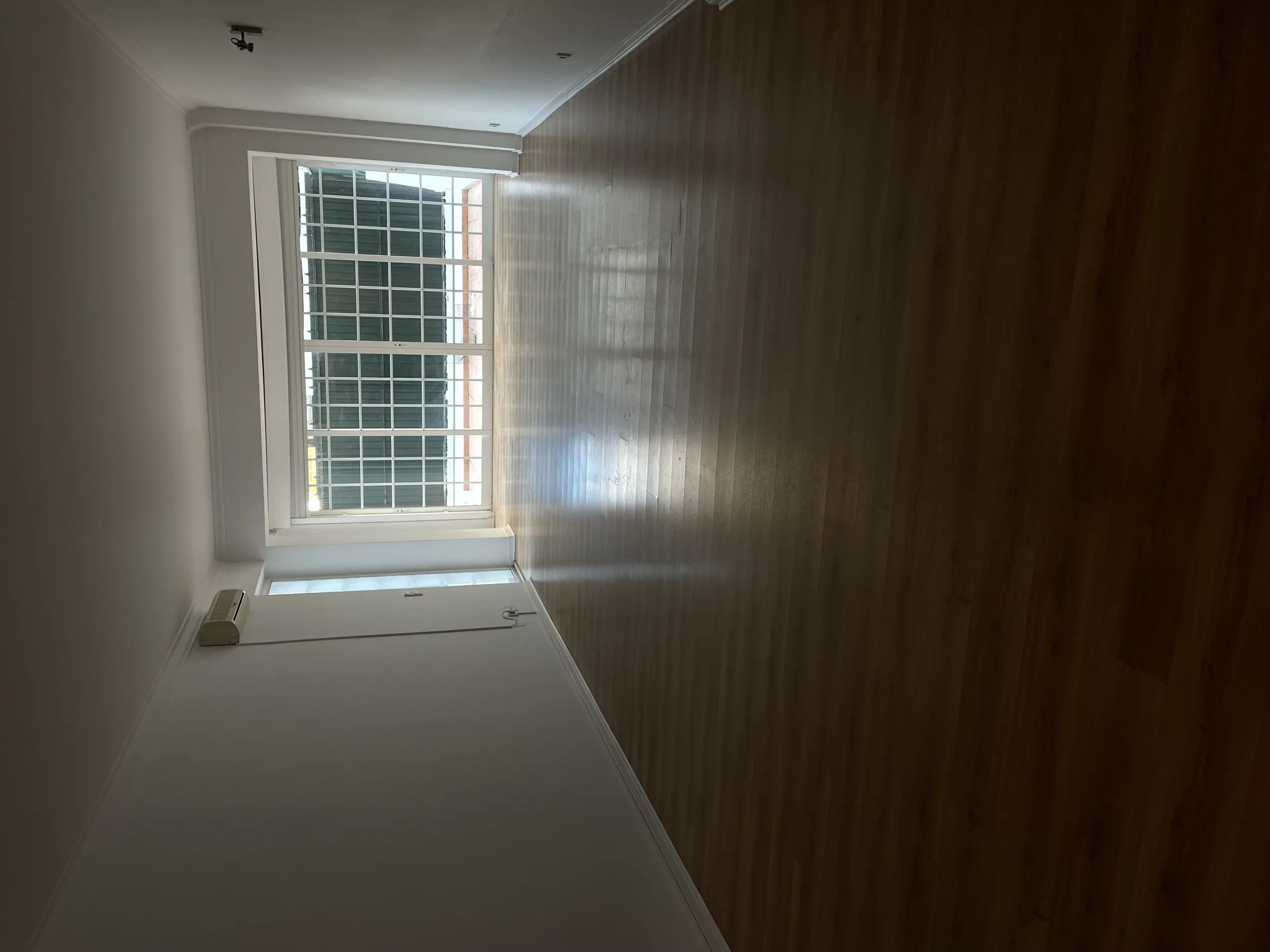 Rosa before &mdash; original living room, heavy wooden furniture and dated finishes