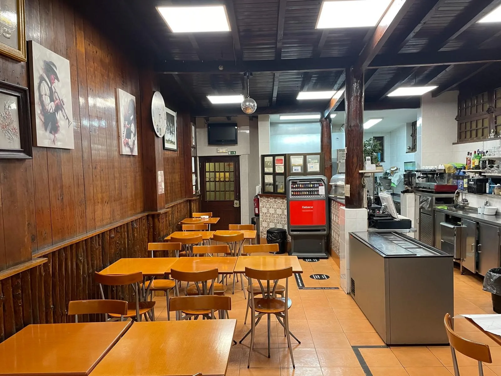 The Tasca before &mdash; the dining room, dated finishes, original floor patches