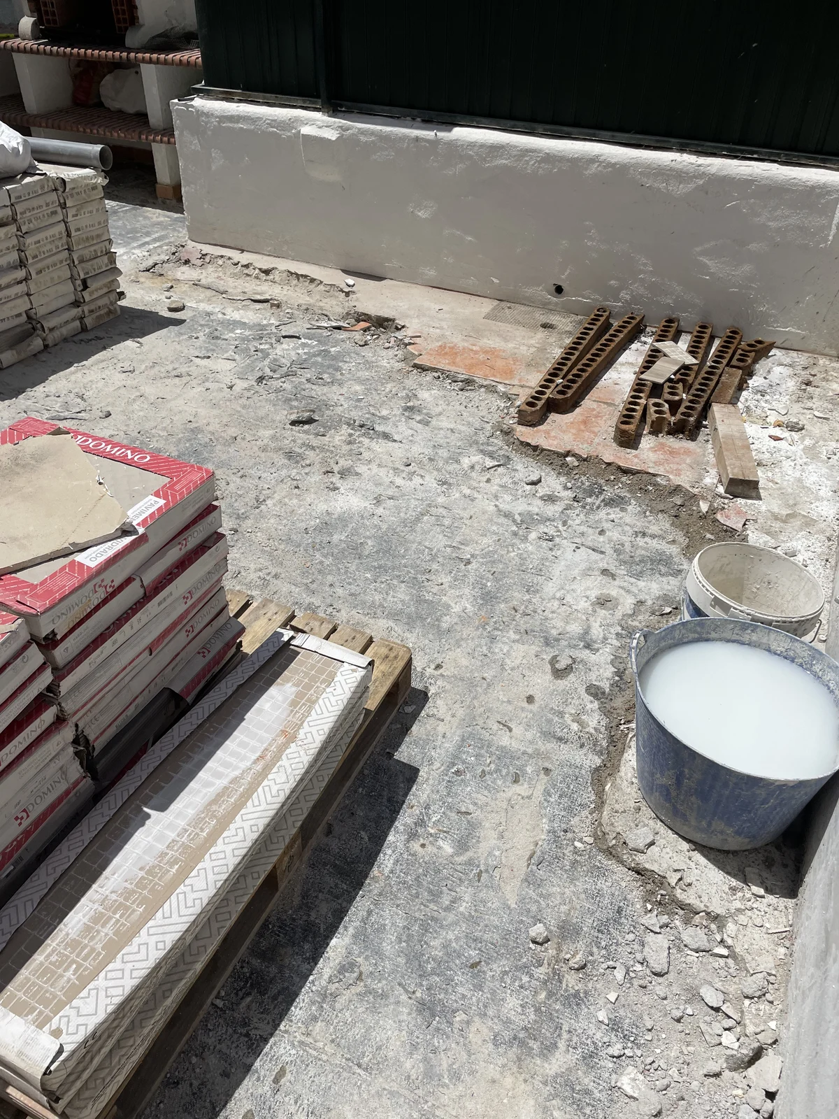 Rosa during &mdash; terrace tiles removed to expose the base for waterproofing