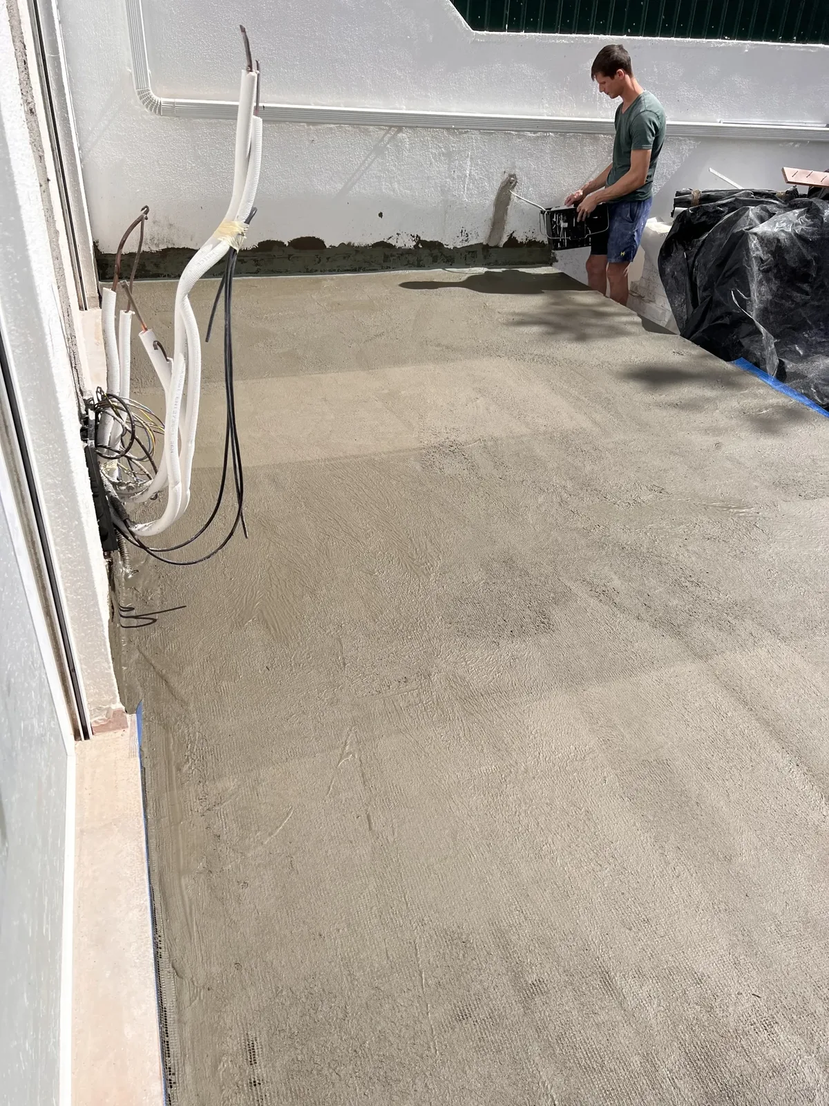 Rosa during &mdash; waterproofing the rebuilt terrace base and perimeter