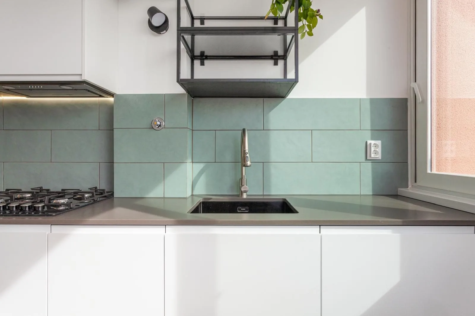 Kitchen sink and window detail — Rebelva T2 apartment renovation by Maya's Homes