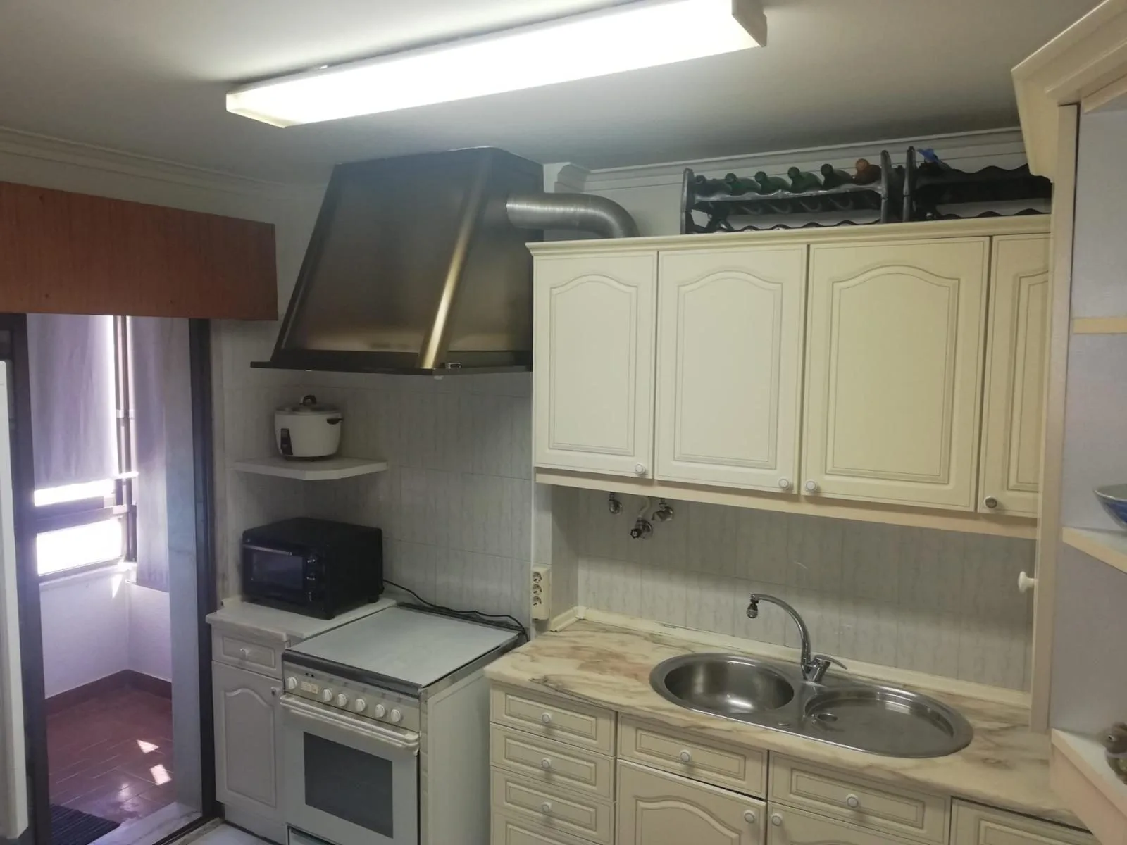 Before — kitchen in Rebelva apartment, Carcavelos