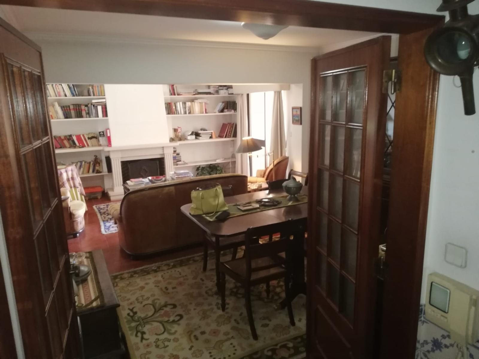 Before — living room with french doors