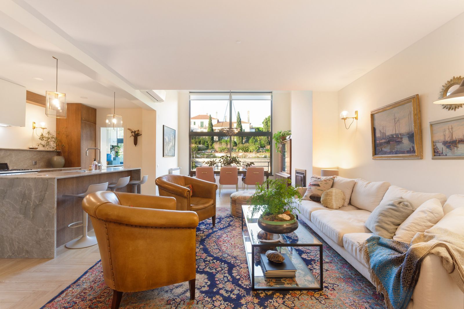 Master bedroom with ceiling fan and artwork