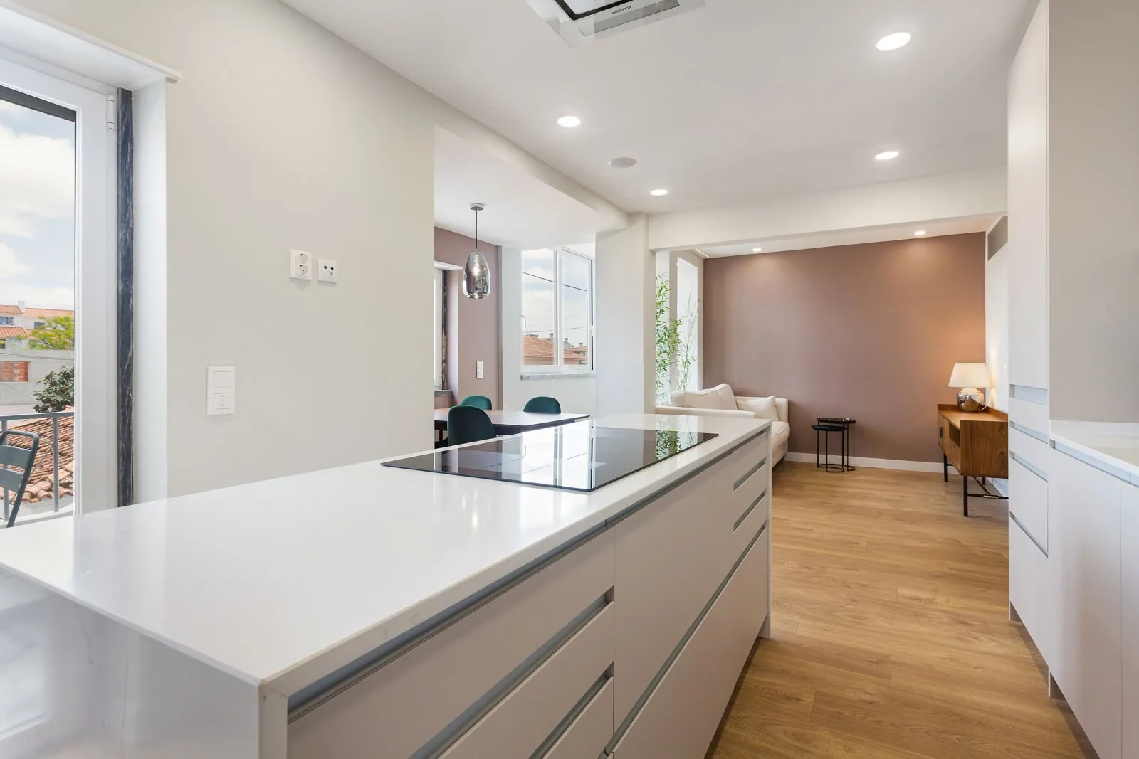 Kitchen from island — Figueiras apartment renovation in Torre, Cascais by Maya's Homes